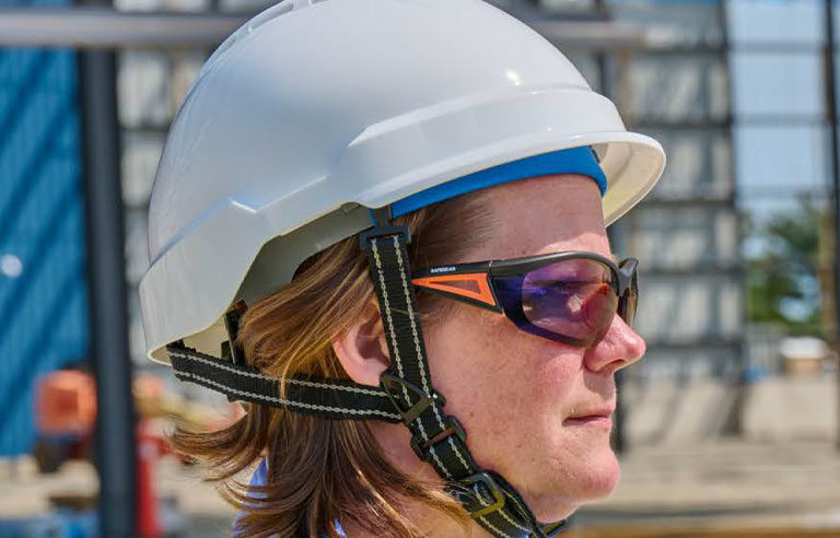 A woman with a hard hat