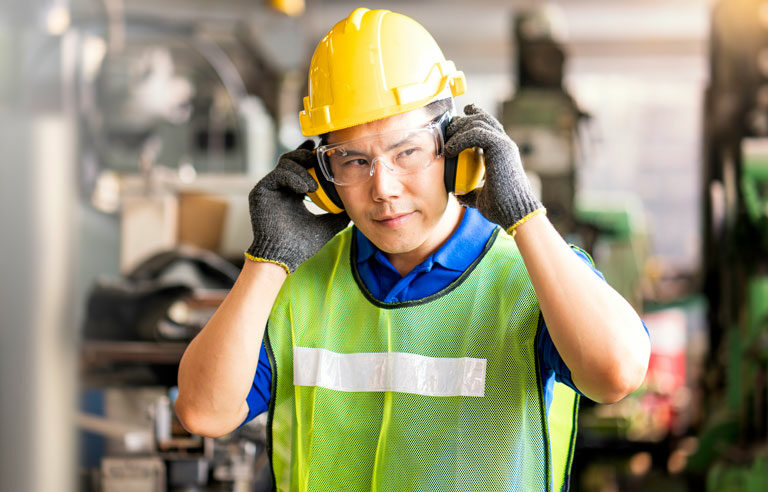  worker with hearing protection