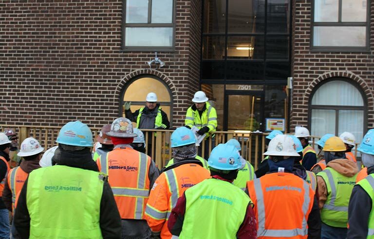 workers at a meeting