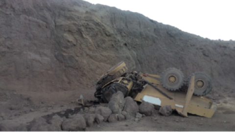 overturned haul truck