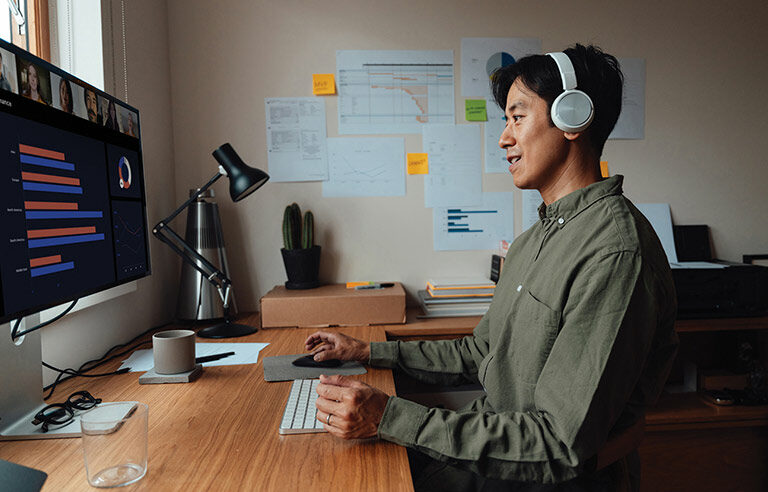 a worker sitting at his desk