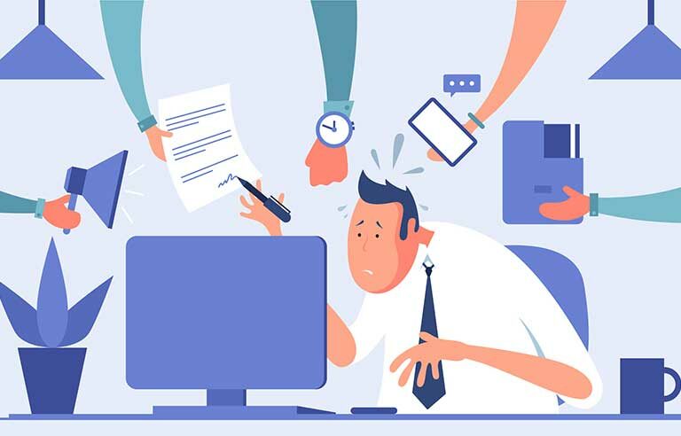 A stressed man working long hours