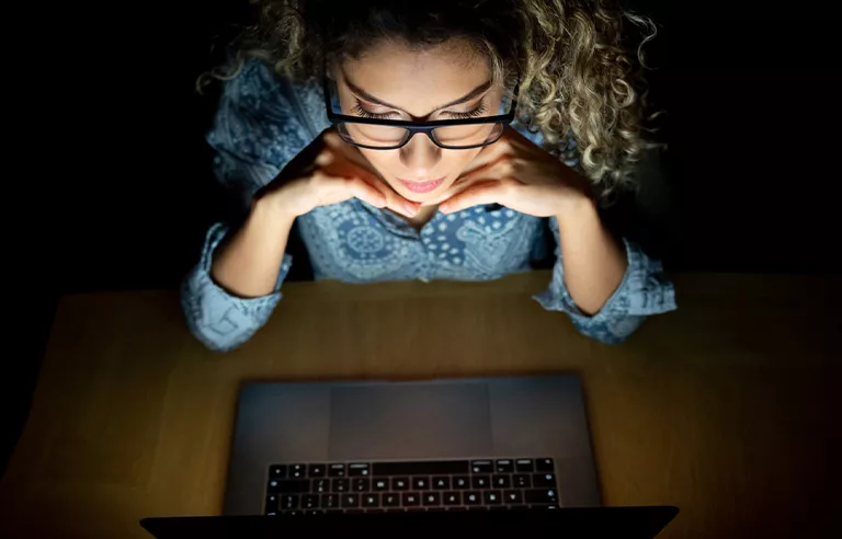 a woman working late into the night