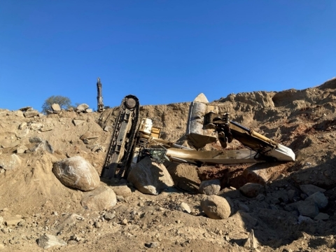 an overturned excavator