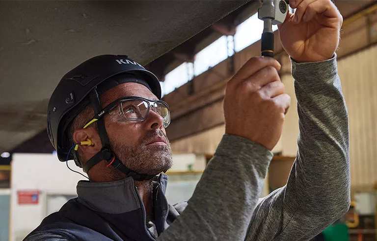 a man wearing protective goggles