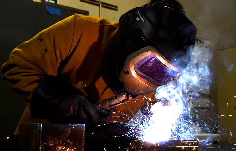 a welder welding