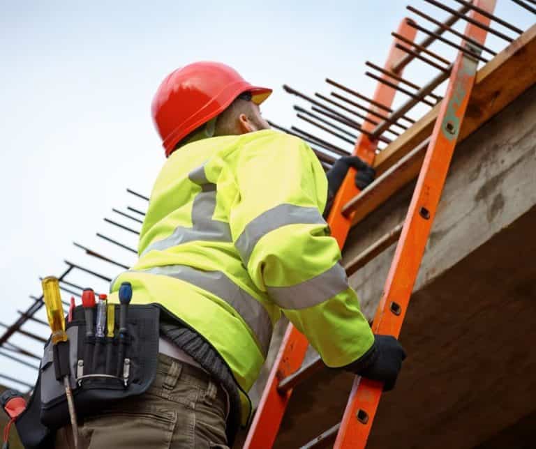 construction worker on a ladder