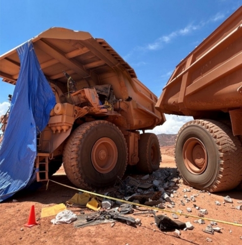 A haul truck collided with another haul truck.